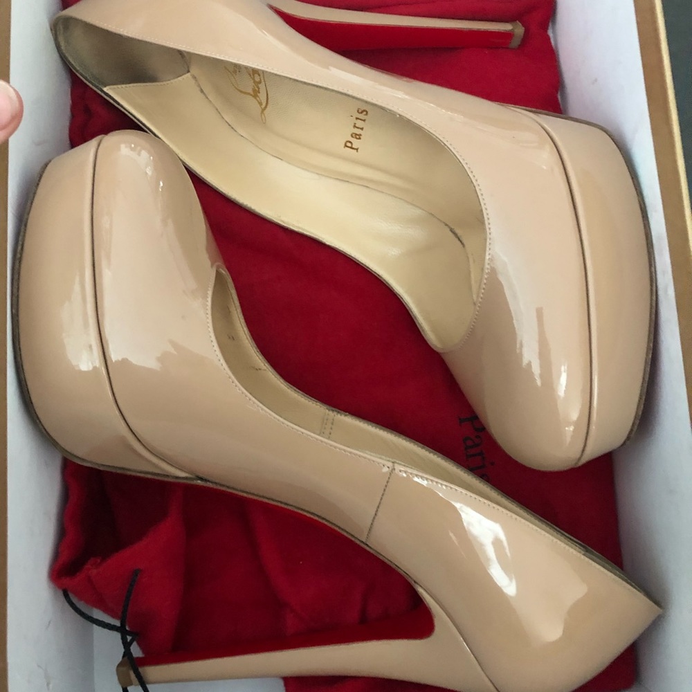 Sol🔴 CHRISTIAN LOUBOUTIN